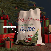 Load image into Gallery viewer, Spike Personalized Christmas gift bag with Santa Claus design and customizable text in a festive setting.
