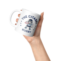 Load image into Gallery viewer, The_Citadel_Womens_Rugby_Mug_-_11oz_Lifestyle_Raised_Hand_LH_Mockup.png
